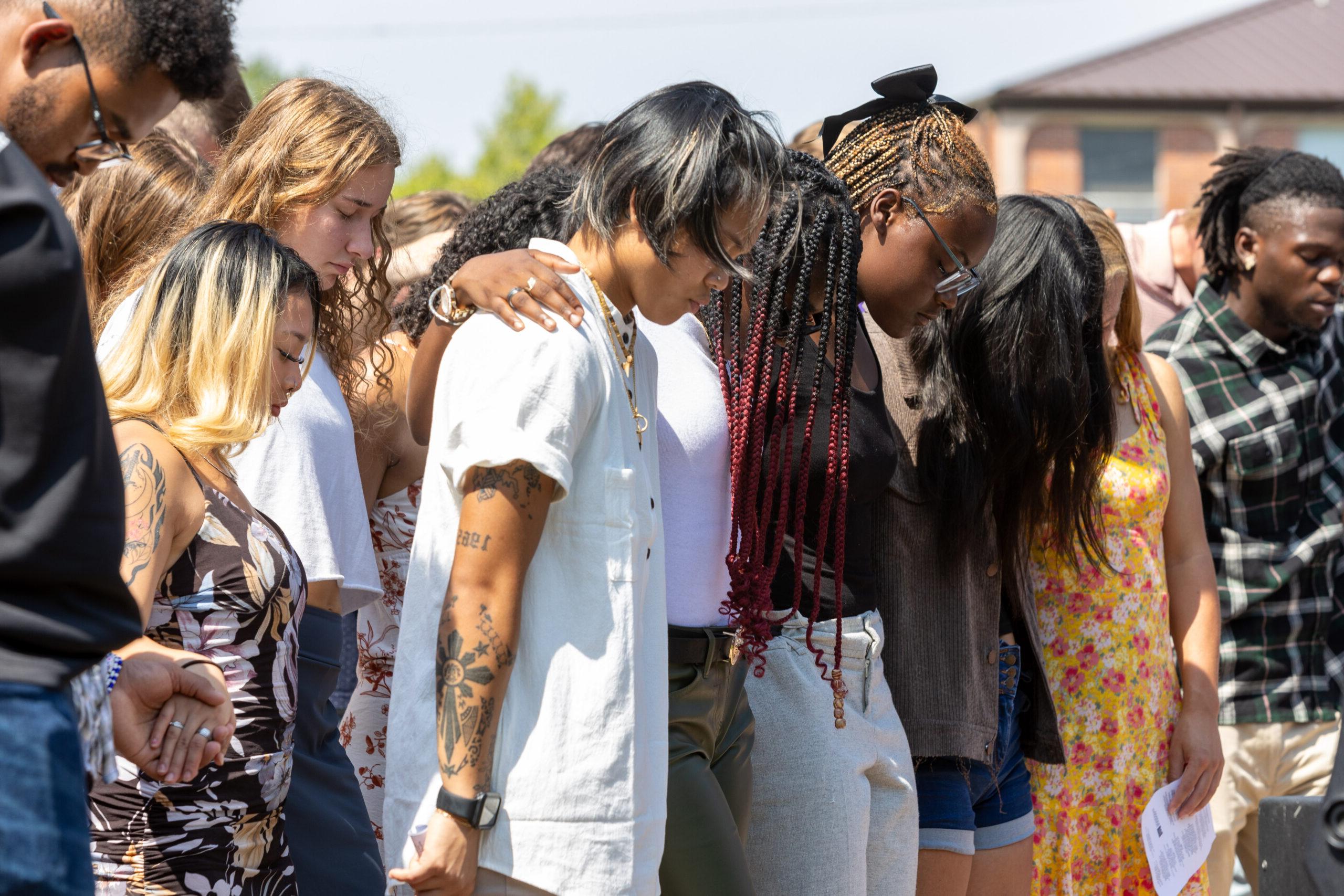 People praying at church service